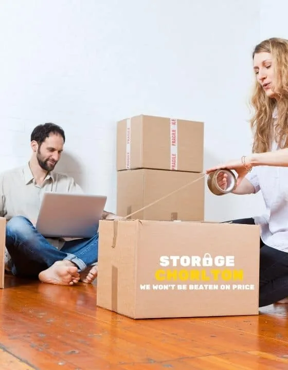 Couple packing Storage Chorlton boxes at home